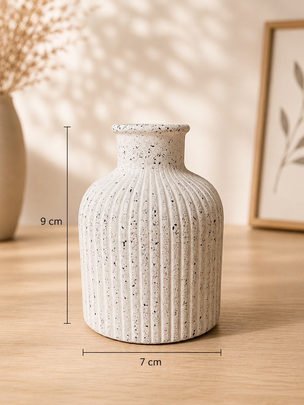 Vase décoratif avec bouquet de fleurs séchées